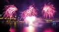 Pink and white fireworks over a big River Royalty Free Stock Photo