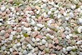 Pink, white and green pebbles gravel background
