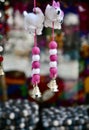 Pink and white hanging showpieces in a shop