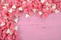 Pink and white heart shape jelly candy background.