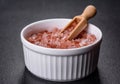 Pink and white large Himalayan salt in a white saucer