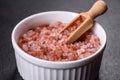 Pink and white large Himalayan salt in a white saucer