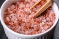 Pink and white large Himalayan salt in a white saucer