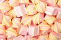 Pink and white marshmallows as background, top view. Dessert pastel colors, sweet food Royalty Free Stock Photo
