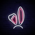 Pink and white neon rabbit ears isolated on dark brick background. Vector illustration.