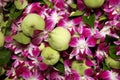 Pink white orchids & Lotus flowers garland offering in buddhist temple, Bangkok, Thailand