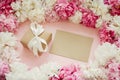 Pink and white peonies with gift box and card on pastel pink paper. Copy space. Stylish creative flat lay. Happy mothers day, Royalty Free Stock Photo