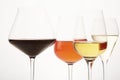 Pink, white, red, sparkling alcoholic drinks in wine glasses. Royalty Free Stock Photo