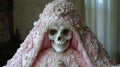 A pink and white skull covered in a veil with pearls, AI