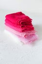 Pink and white textile on white background Royalty Free Stock Photo