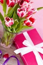 Pink and white tulips present ribbon easter birthday