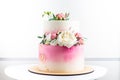 Pink and white wedding bunk cake with fresh flowers decoration Royalty Free Stock Photo