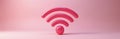 Pink wifi symbol standing on pink background in studio. Cyberspace wireless network tech, communication connection with digital Royalty Free Stock Photo