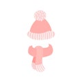 Pink winter knitted hat with pompon and scarf Royalty Free Stock Photo