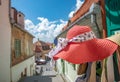 Pink women hat close-up on The Stairs Tower in a beautiful medieval town of Sibiu on a sunny summer day with blue sky, Sibiu,