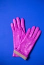 Pink women`s winter gloves made of soft genuine leather and wool lining Royalty Free Stock Photo