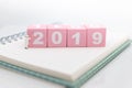 Pink wooden block number 2019. Image use for background happy new year, fresh ,business concept.