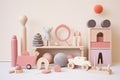 Pink wooden children's toy set with a table and a shelf and different soft colored wood toys for playing. Brain and