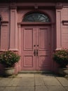 pink wooden door on old victorian house ai generated Royalty Free Stock Photo