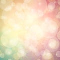 Pink yellow and blue green background with white bubbles or bokeh lights