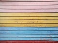 Pink yellow blue red plank wooden board background wall