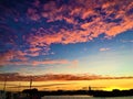 Pink, yellow, blue... sunset, harbour and the sea Royalty Free Stock Photo