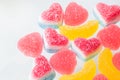 Pink and yellow chewy candies in powdered sugar Royalty Free Stock Photo