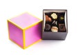 Pink an yellow chocolate praline box ready to be offered as a gift Royalty Free Stock Photo