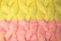 Pink and yellow knitted fabric background Royalty Free Stock Photo