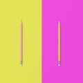 Pink and yellow pencils on pastel pink and yellow contrast background Royalty Free Stock Photo