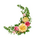 Pink and yellow rose flowers with eucalyptus leaves in a corner Royalty Free Stock Photo