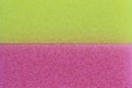 Pink and yellow sponge surface background. Royalty Free Stock Photo