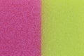 Pink and Yellow sponge surface background. Royalty Free Stock Photo