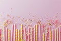 Pink and Yellow Striped Straws With Confetti and Streamers Royalty Free Stock Photo