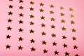 Pinky holiday background with golden stars Royalty Free Stock Photo