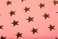 Pinky holiday background with golden stars Royalty Free Stock Photo