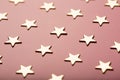 Pinky holiday background with golden stars Royalty Free Stock Photo