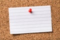 Pinned blank paper note on cork board Royalty Free Stock Photo