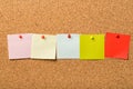 Pinned paper notes on cork board Royalty Free Stock Photo
