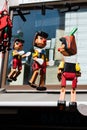 Pinocchio dolls with long nose. Conceptual fairy tale character Royalty Free Stock Photo