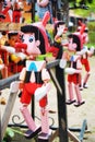 Pinocchio dolls, made of wood. Royalty Free Stock Photo