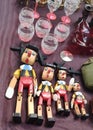 Pinocchio puppets made from wood at flea market Royalty Free Stock Photo