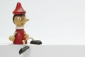 Pinocchio, wooden toy, a character from children\'s stories Royalty Free Stock Photo