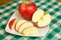 Pinova apple slices on white plate Royalty Free Stock Photo