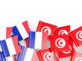 Pins with flags of France and tunisia isolated on white