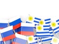 Pins with flags of Russia and uruguay isolated on white