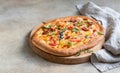 Pinsa with vegetables and cheese, concrete background. Traditional rome pizza