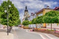 Main Promenade Street and Bell tower of Cathedral of Assumption of Virgin Mary in Pinsk as