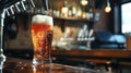 A pint of beer being poured at a bar Royalty Free Stock Photo