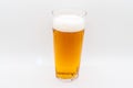 Pint of cold lager beer in a glass d isolated on a white background Royalty Free Stock Photo